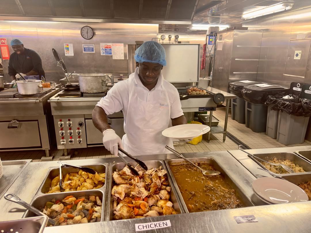 Germisa chef serving lunch in a corporate kitchen