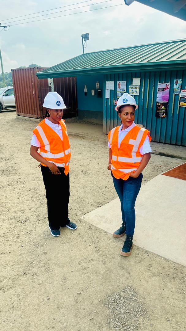 Two Germisa engineers in hi-vis vests and hard hats on site